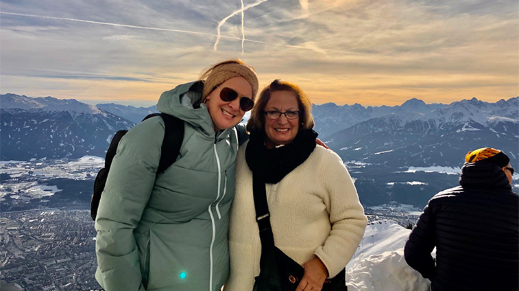 Nicole and Kathy with mountain landscape