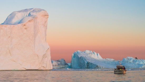 Ilulissat icebergs in midnight sun